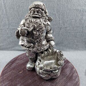 Detailed Silver Santa Claus Collectible Sculpture With Intricate Gift Basket